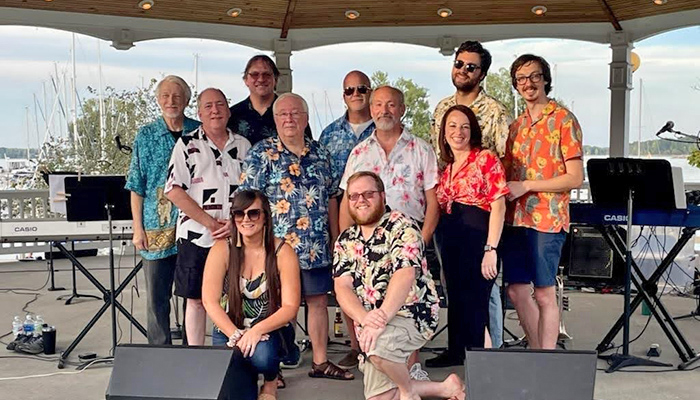Photo of the KEX band members at the Sackets Harbor Bandstand in 2023