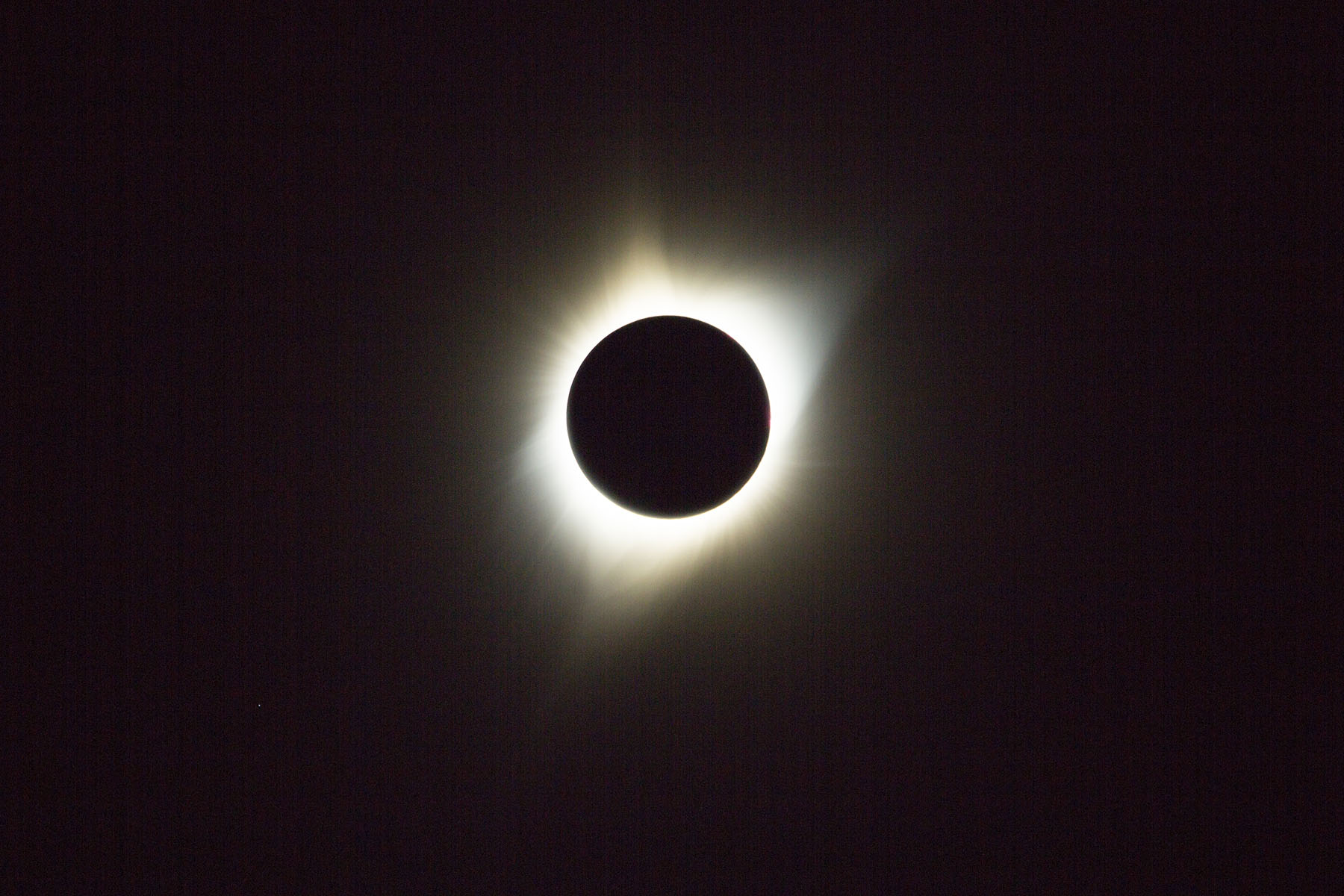 Photo of the sun totally obscured by the moon during a total solar eclipse